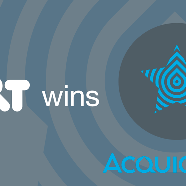 A grey background with the saying Acquia Partner of the Year 2017