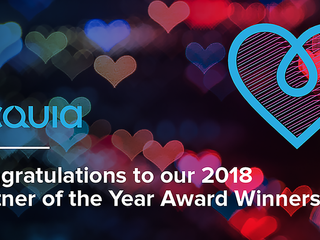 Acquia logo in a dark background full of colorfull hearts