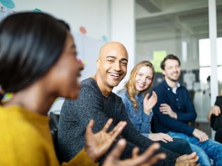 Business team smiling during a meeting