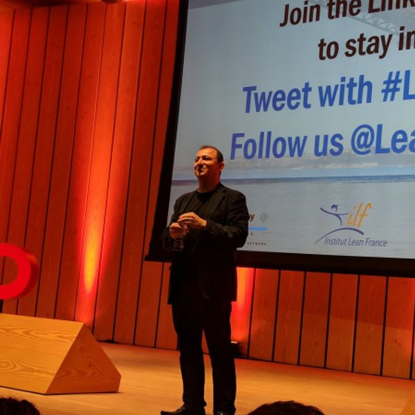 Cesar Gon on stage at Lean Summit