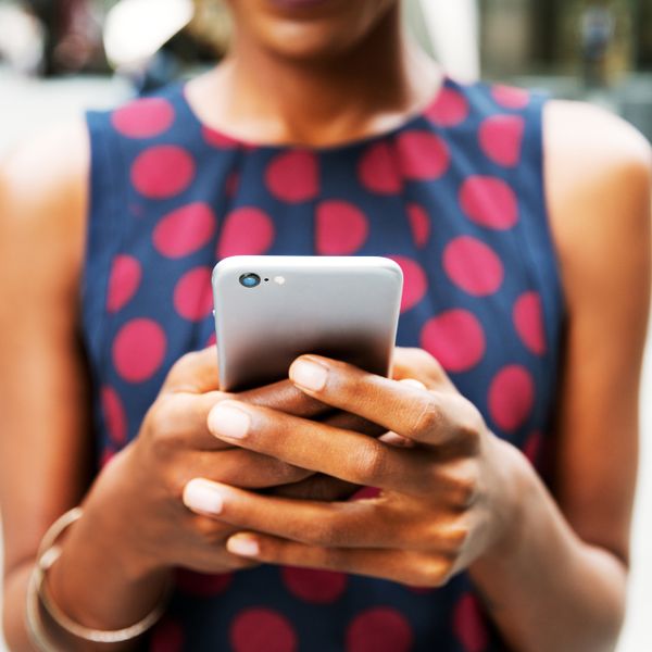 Close up of a person holding a smartphone