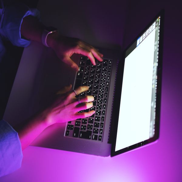 Person using laptop late at night