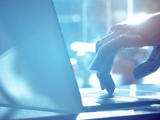 Robot finger point to laptop button