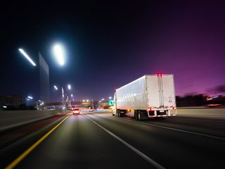 Truck on highway at night
