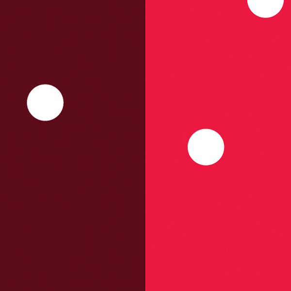 A red background with white circles