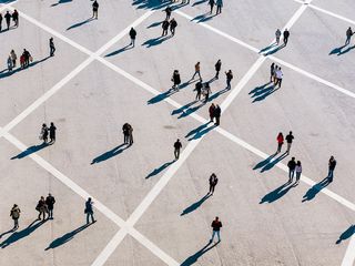 Top view of people walking on street