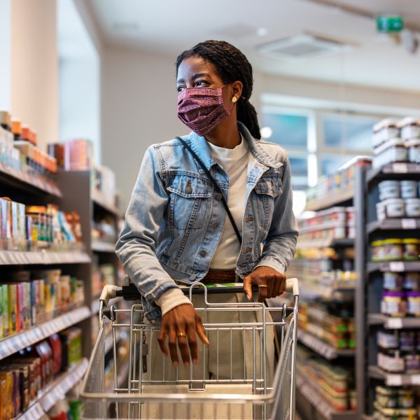 Woman at a grocery store wearing mask