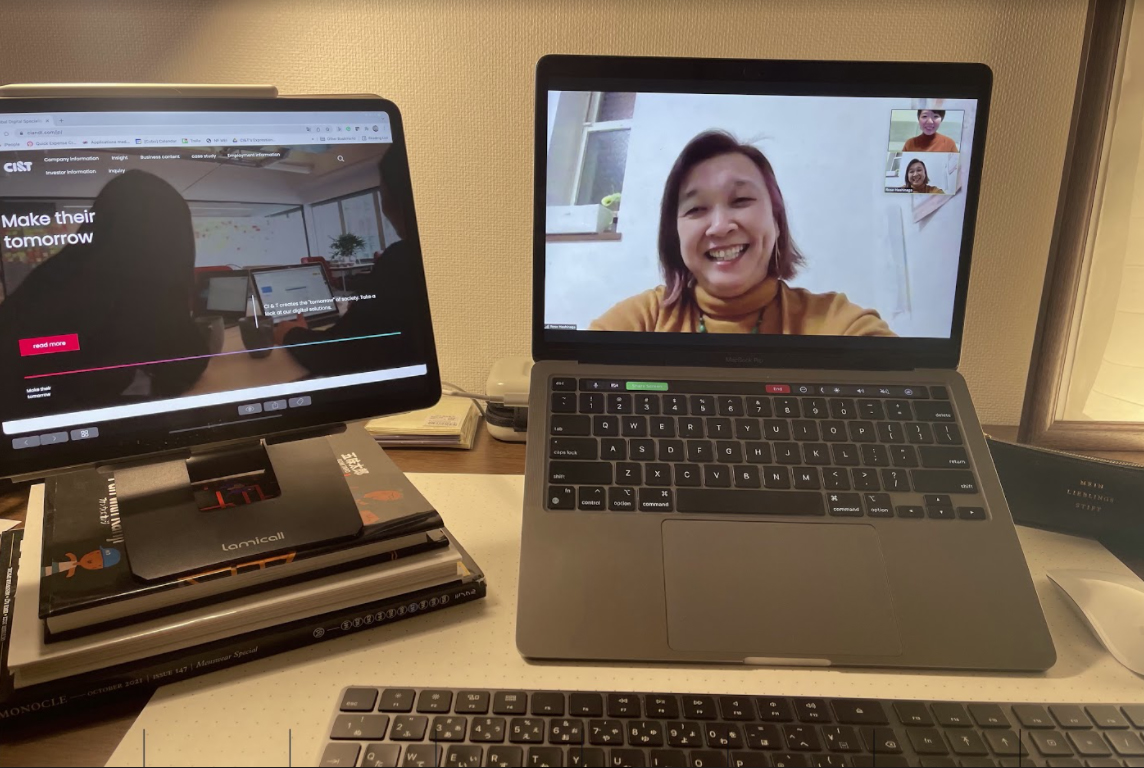 Rose smiling in the laptop screen