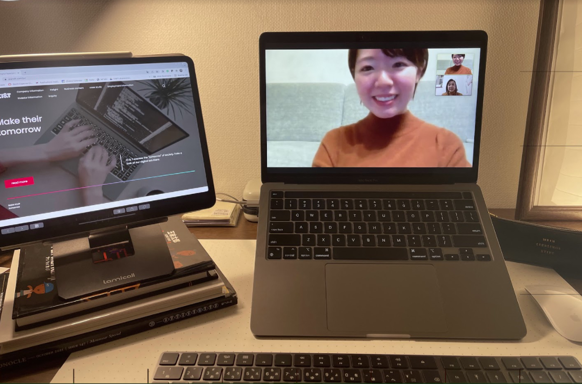 Shiho smiling in the laptop screen