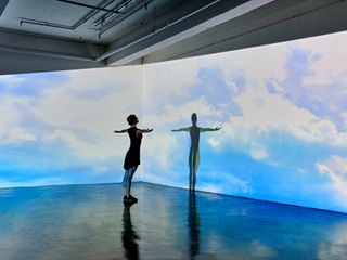 woman looking to her shadow as a inspiration