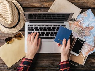 Hands holding a passport