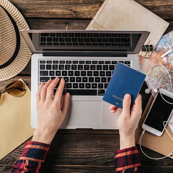 Hands holding a passport