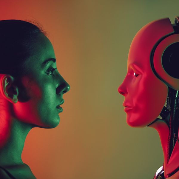 ai-robot-and-young-woman-face-to-face