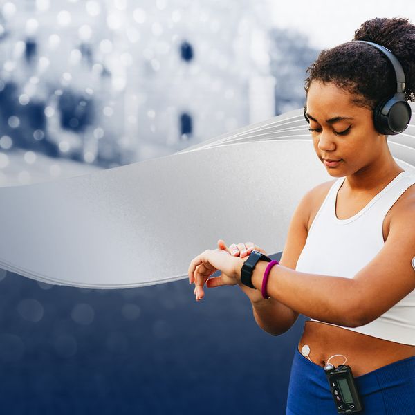 Young woman stopping her exercise to check her health via wearable devices 