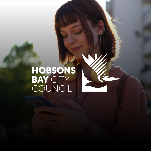 Young woman using her cellphone outdoors