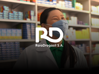 An asian female pharmacist talking to a costumer