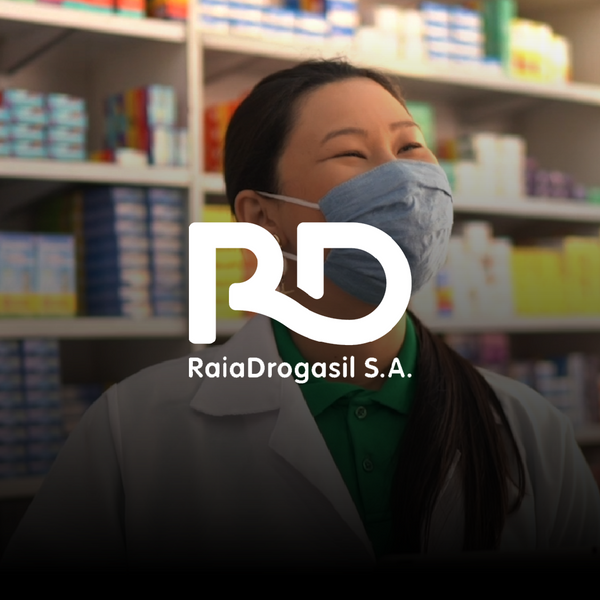 An asian female pharmacist talking to a costumer