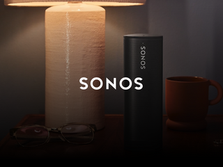 A Sonos equipment on a bed table