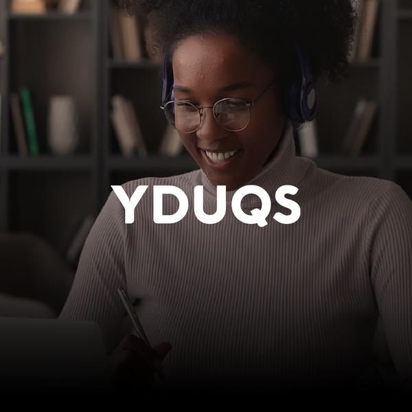 A black woman studying on her computer