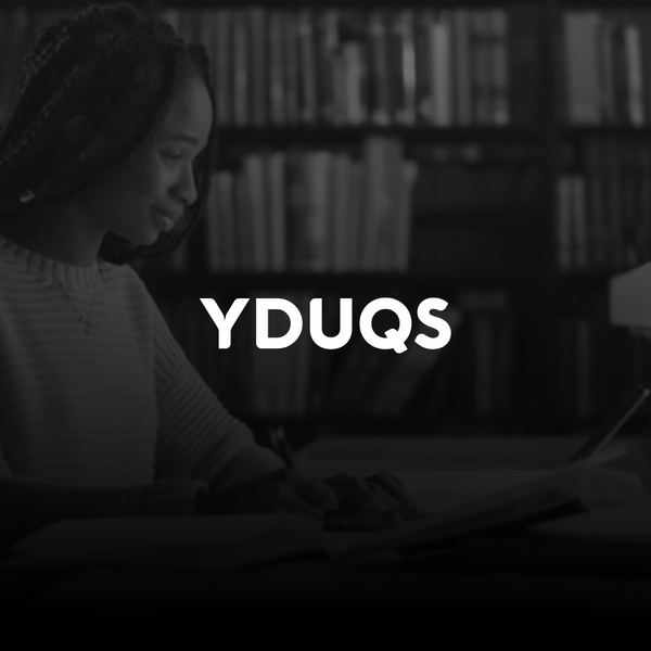 Black girls studying on her computer, at a library