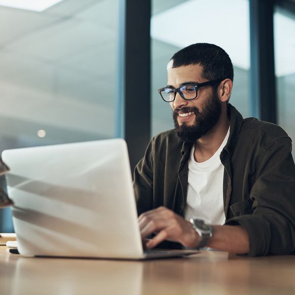 young man using a laptop 