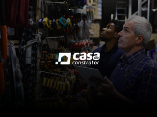 Two men working at a building supplies store