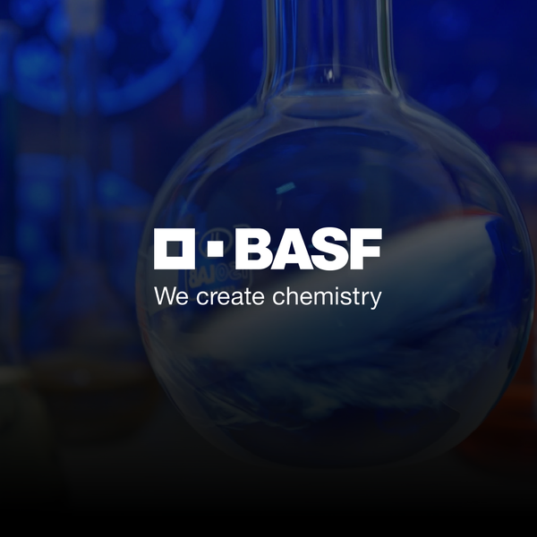 BASF logo in white, and as background, an image of a flask filled with a blue liquid, in a laboratory