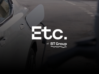 BT logo in white, and as background, an image of a car being charged.