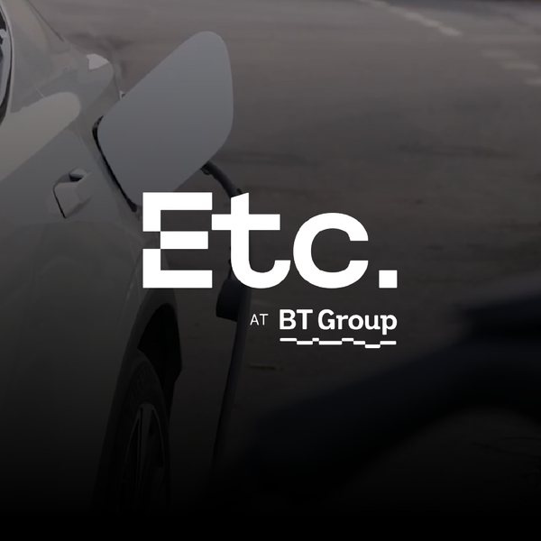 BT logo in white, and as background, an image of a car being charged.