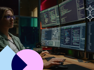 Cyber Security Student Coding on Desktop PC With Six Monitors Setup in Dark Office
