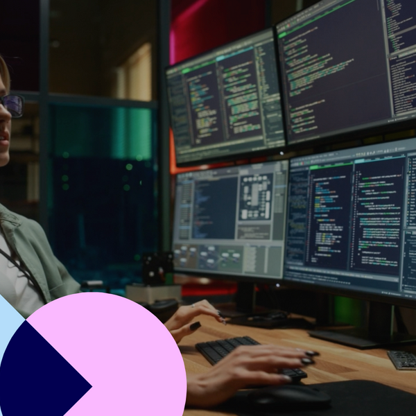 Cyber Security Student Coding on Desktop PC With Six Monitors Setup in Dark Office