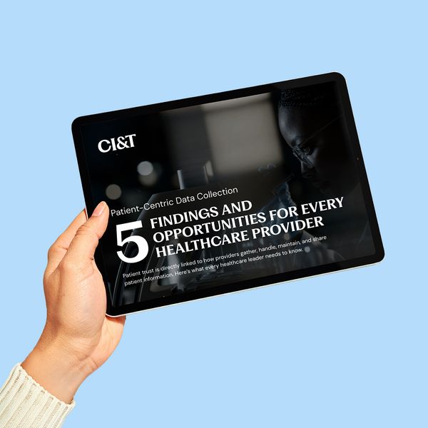 Hand holding a tablet displaying the cover of a report titled '5 Findings and Opportunities for Every Healthcare Provider' with a focus on patient-centric data collection.