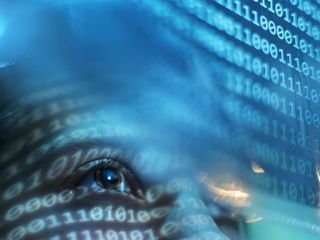 Woman looking at transparent digital graph in front of her