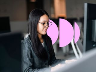 Young asian woman working and doing a virtual business meeting on laptop at modern office.