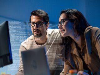 duo analyzes data and explores machine learning solutions discussing-advanced coding techniques