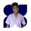 Antonio Lucas, homem negro de cabelo cacheado preto e olhos pretos, sorrindo. Ele veste uma camisa de bot&atilde;o lil&aacute;s.