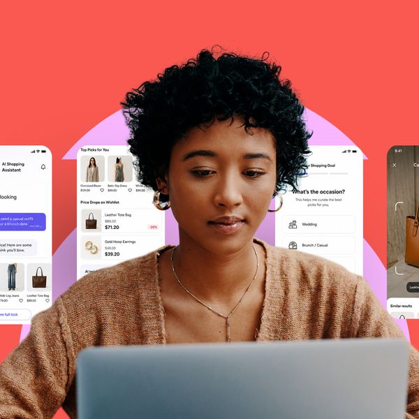 A woman looking at a computer screen while online shopping